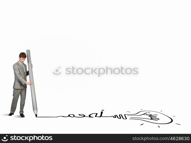 My great plan. Businessman drawing word idea with huge pencil