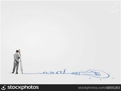 My great plan. Businessman drawing word idea with huge pencil
