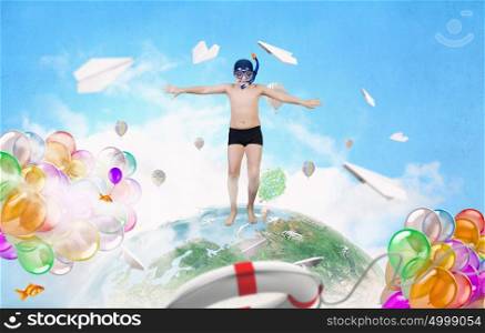 My great summer vacation. Kid boy in diving mask making jump in to water. Elements of this image are furnished by NASA