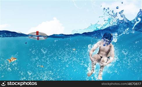 My great summer vacation. Kid boy of school age in diving mask jumping in water