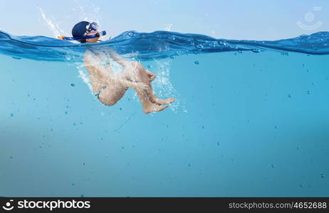 My great summer vacation. Kid girl in diving mask jumping in water