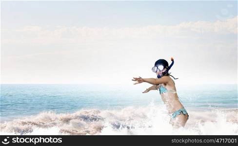 My great summer vacation. Kid girl of school age in diving mask having fun