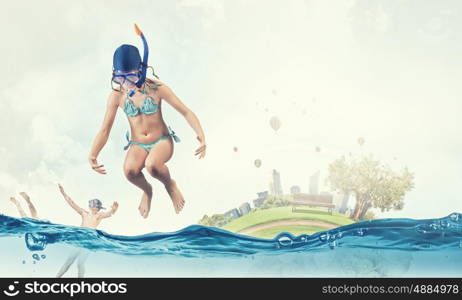My great summer vacation. Kid girl of school age in diving mask having fun