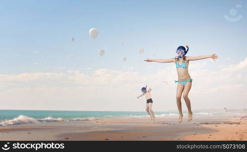 My great summer vacation. Kid girl of school age in diving mask having fun