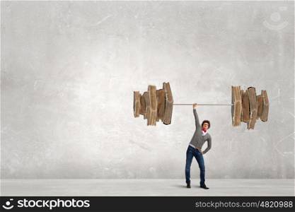 My power in knowledge. Confident businessman lifting above head sketched barbell