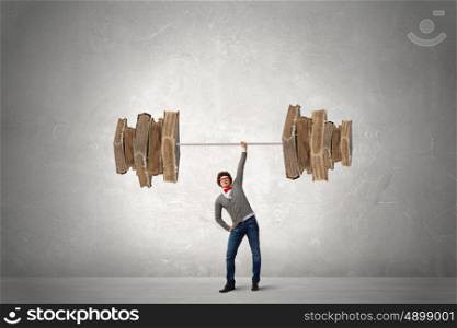 My power in knowledge. Confident businessman lifting above head sketched barbell