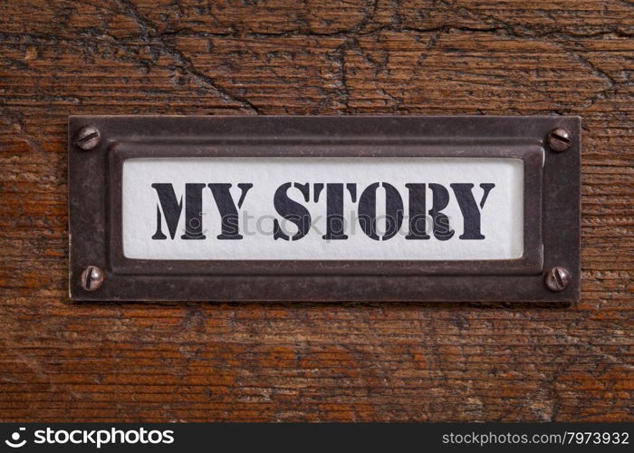 my story - file cabinet label, bronze holder against grunge and scratched wood