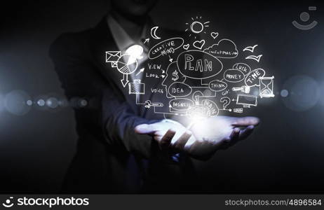 My strategy plan. Businessperson hands presenting business idea sketch on palms