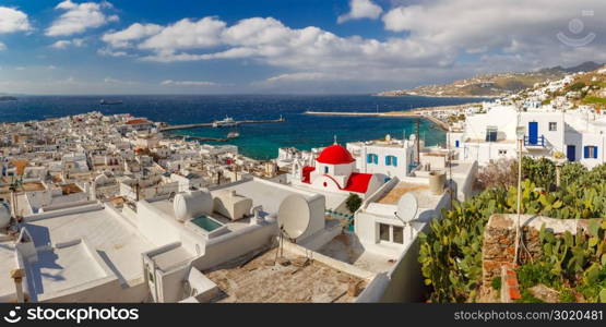 Mykonos City, Chora on island Mykonos, Greece. Panoramic aerial view of Old Port of Mykonos City, Chora, on the island Mykonos, The island of the winds, Greece