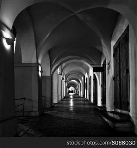 mysterious narrow archway in Prague at night