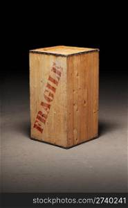 "Mysterious old wooden crate with word "Fragile"."