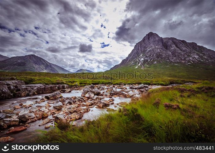 Mystic river mountain landscape scenery in Scotland. Glen Coe, Scottish Highlands