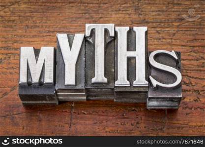 myths word in vintage metal type printing blocks over grunge wood