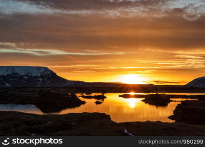 Myvatn lake at sunrise in winter, Iceland. Myvatn lake at sunrise, Iceland