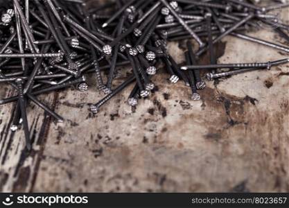nails. Nails on a wooden background