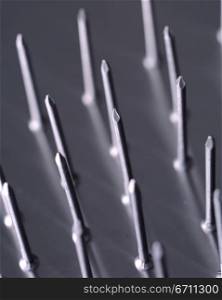Nails on a metal surface