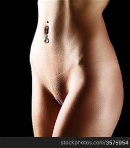 Naked beauty. Female body over black background