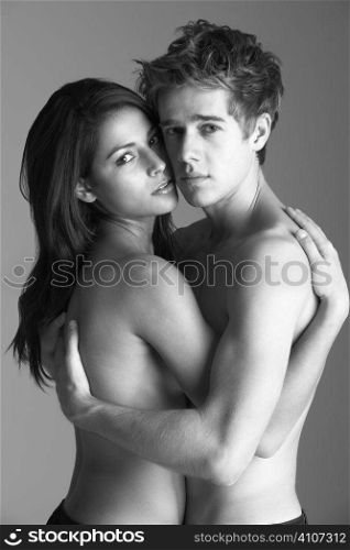 Naked couple embracing