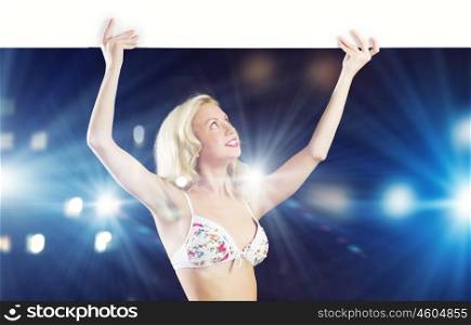 Naked girl with banner. Girl in swim wear holding white blank banner above head. Place for text