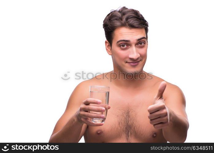 Naked man drinking water isolated on white
