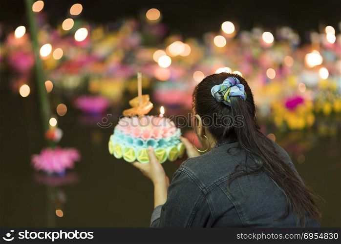 NAKHONNAYOK THAILAND - NOVEMBER 25 : Loy Krathong festival. Unidentified women dressed in traditional candle lighting ceremony to worship. on November 25, 2015 in Nakhonnayok, Thailand.