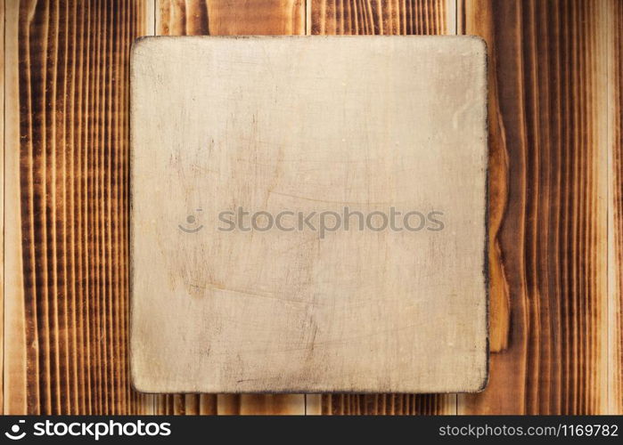 nameplate or wall sign at wooden background texture surface