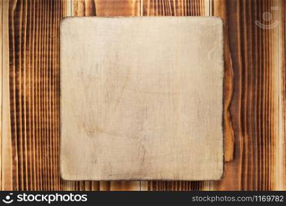 nameplate or wall sign at wooden background texture surface