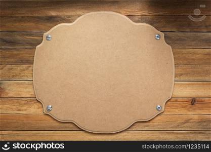 nameplate or wall sign at wooden background texture surface, with screws