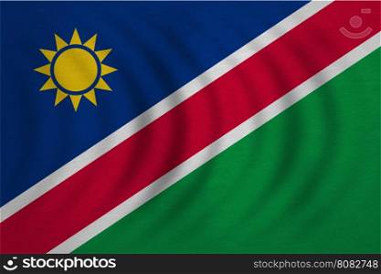 Namibian national official flag. African patriotic symbol, banner, element, background. Correct colors. Flag of Namibia wavy with real detailed fabric texture, accurate size, illustration