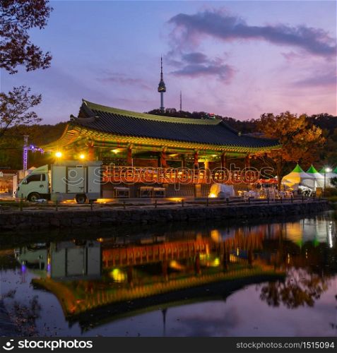 Namsangol traditional village and seoul tower at autumn color ,south korea.