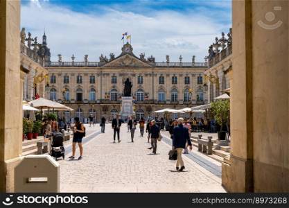 Nancy, France - 1 June, 2022  the historic Arc Here city gate on the Place Stanislas square in the city center of Nancy