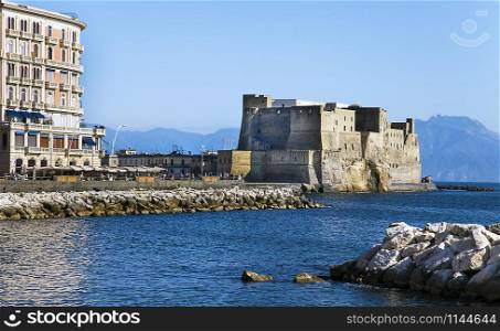 Naples, Italy The Castel dell?Ovo is a coastal castle in Naples, located on the former island of Megaride, now a peninsula, on the Gulf of Naples in Italy.. Castel dell?Ovo, a medieval fortress in the Bay of Naples. Italy