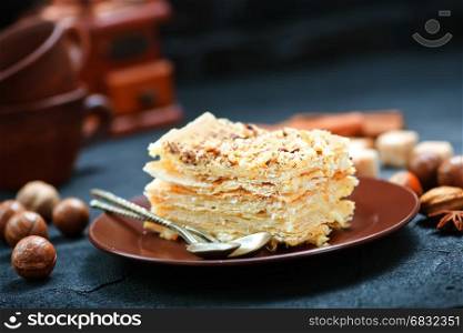 Napoleon tart on plate and on a table