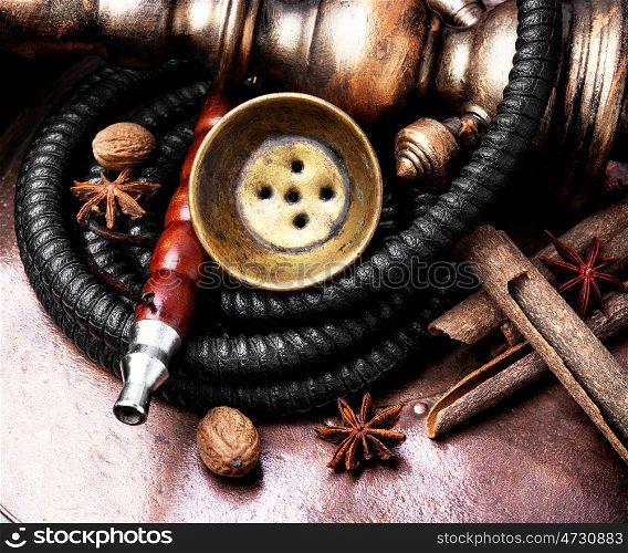 Nargile with spices. Smoking smoking shisha with tobacco aroma of spices.Oriental hookah