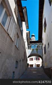 Narrow Alley With Old Buildings In Italian City