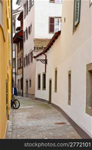 Narrow Alley with Old Buildings in Swiss City of Lucerne