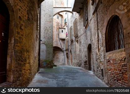 Narrow Alley with Old Buildings in the Italian City