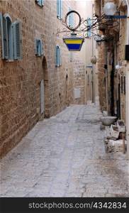 Narrow cobbled street in the ancient port of Jaffa in Israel