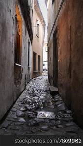 Narrow medieval lane at Vilnius, old town of early morning in a rainy day