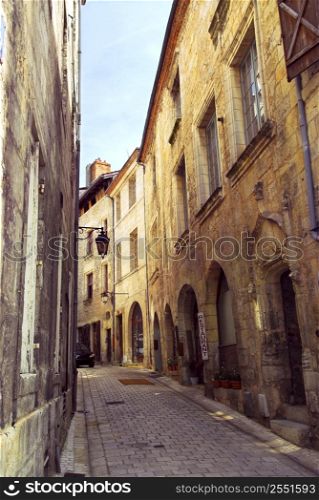 Narrow medieval street in town of Perigueux, Perigord, France