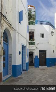 Narrow old street in the medina of Asilah, Morocco