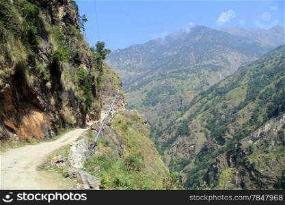Narrow rocky road in mountain in Nepal