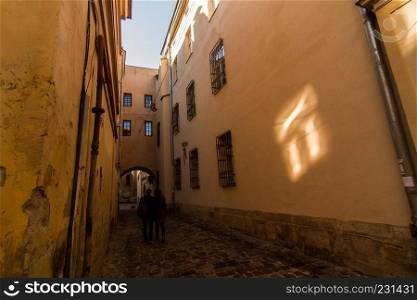 narrow street at evening in Lviv, located in western part of Ukraine