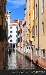 narrow street. Houses over the channel. Venice