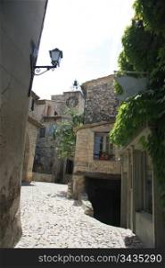 Narrow street in a small village in the Provence, France