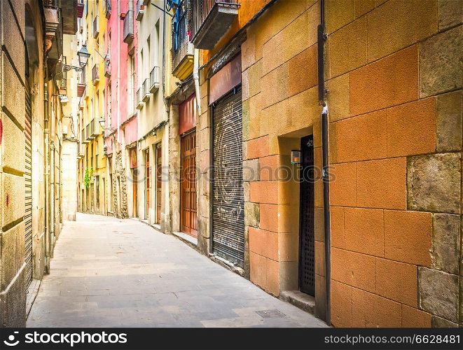 narrow street in Barrio Gotic quarter of Barcelona, Spain, toned. Gotic quarter of Barcelona