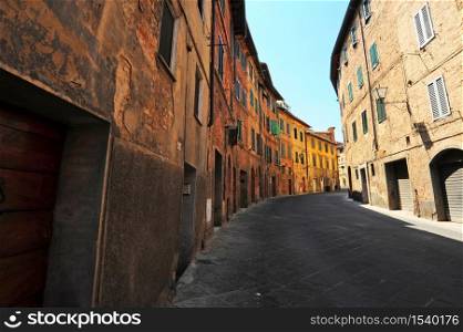 Narrow street in the medieval Italian city of Siena. Retro style