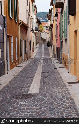 Narrow street in the old town in France