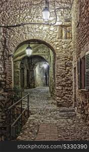 Narrow street in the old town in France at night . Narrow street in the old town Eze in France at night