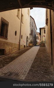 Narrow street in the old town in Italy